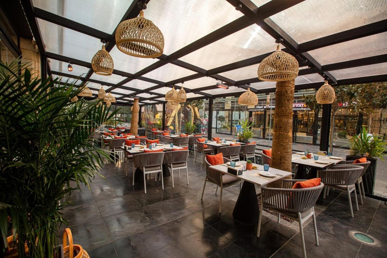 The Abdali Boulevard Hotel Ammán Exteriér fotografie The interior of the restaurant